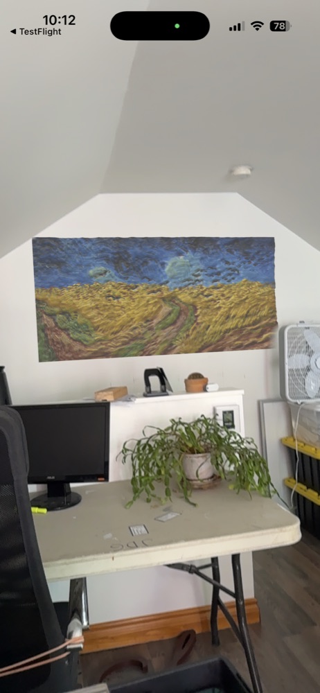 Wheatfield with Crows by Van Gogh, as a 3D relief, shown in augmented reality in an office